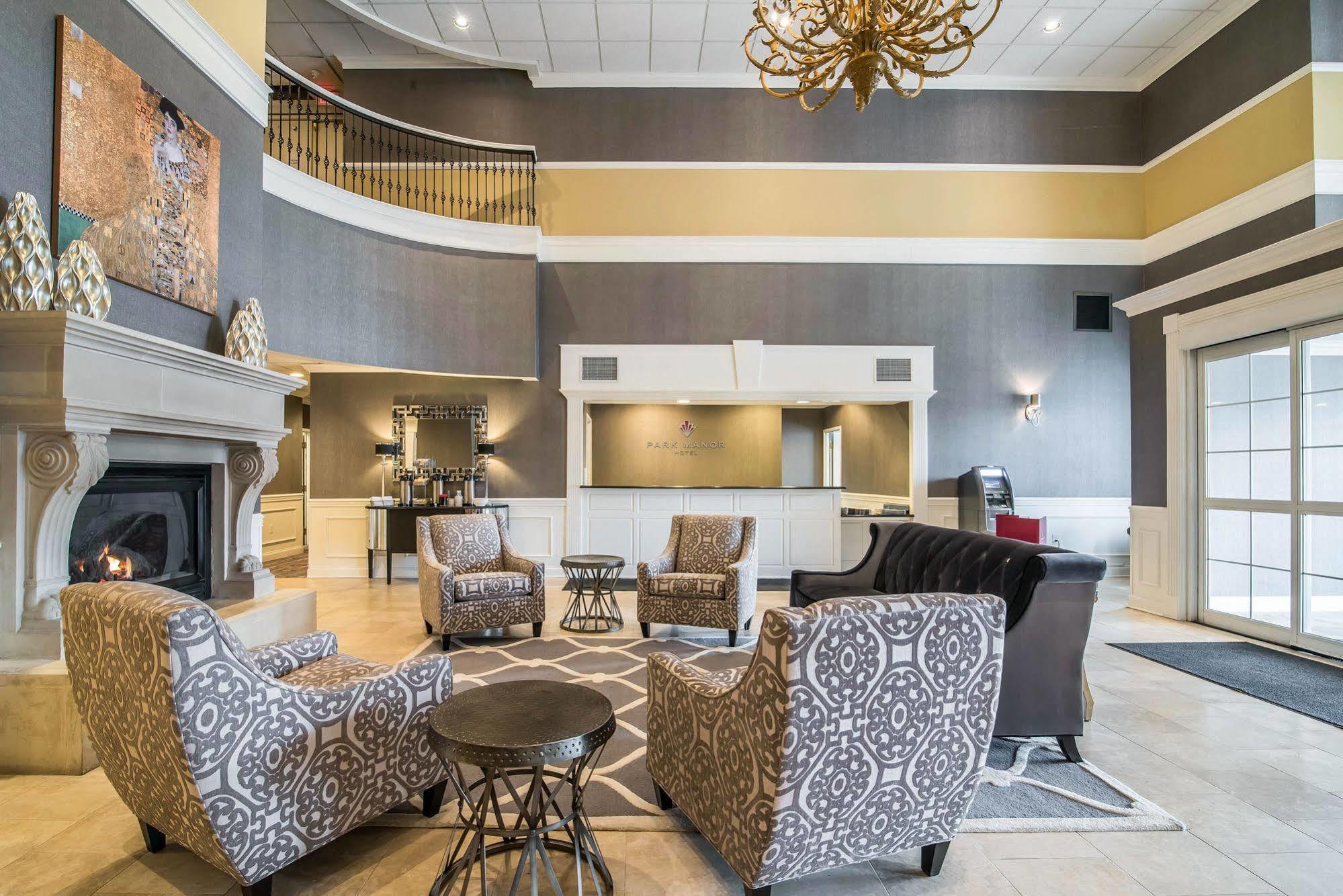 Park Manor Hotel Clifton Park Exterior photo The lobby of the Best Western Premier Executive Residency Royal Palm Beach